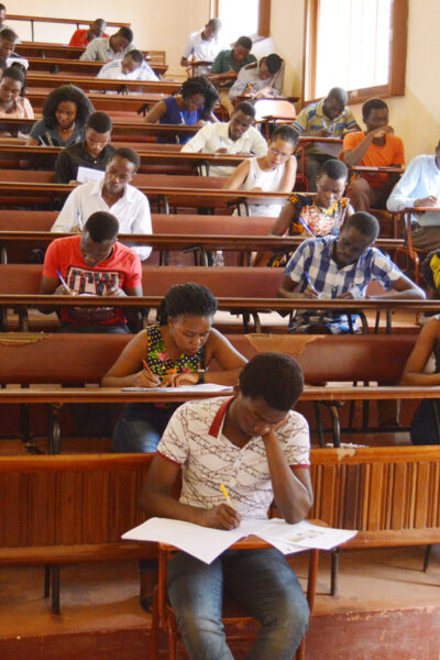 Students sit for an exam in the pre-COVID era, Makerere University, Kampala Uganda.